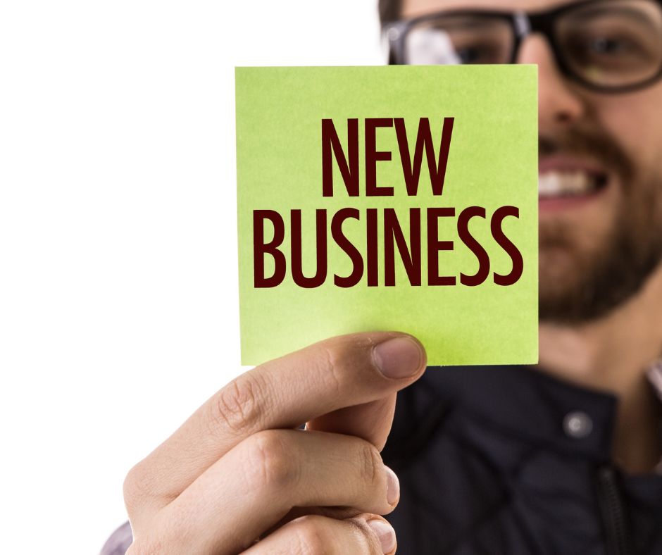 a sticky note that says "New Business"