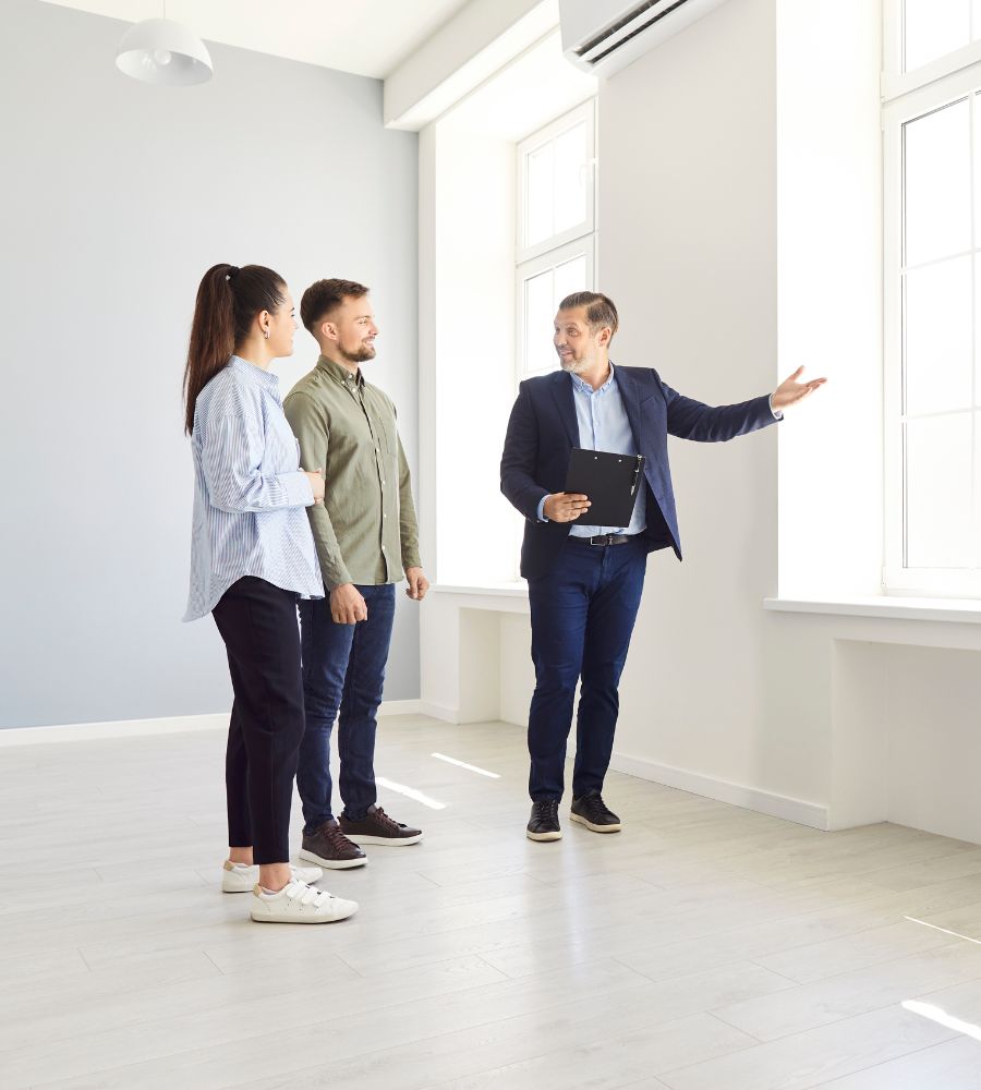 real estate agent talking to his clients