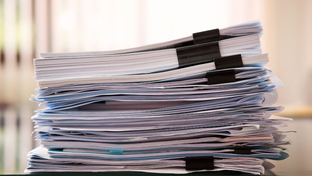 stacks of documents ready for scheduled shredding